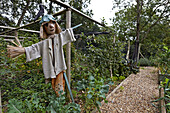 Scarecrow in an English garden, Rockwood, Newbury, West Berkshire, England, United Kingdom