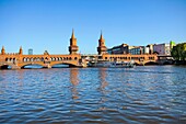 Oberbaum Bridge over Spree River  Kreuzberg district  Berlin  Germany.