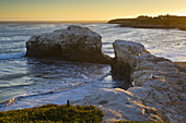 Sunset at Natural Bridges State Beach, Santa Cruz, California.