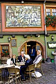 Alsace wine route town Riquewihr France vineyard harvest grapes town details