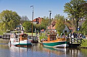 A steam boat replica in the harbour of Carolinensiel, East Frisia, Lower Saxony, Germany, Europe