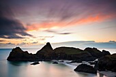 Sunset at Kynance Cove on the Lizard Peninsula Cornwall England UK