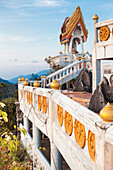 Small pagoda on top of a Buddhist temple mountain, hilltop view, karst landscape, jungle with green lush vegetation, part of the buddhist monastery Tiger Cave Temple, Wat Tahm Sua, Wat Tham Sua, Krabi, Thailand