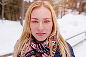 Young woman looking at camera, Spitzingsee, Upper Bavaria, Germany