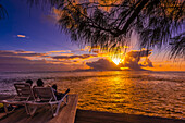Sunset seen from Manava Suite Beach Resort, Punaauia, Tahiti, French Polynesia.