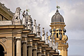  statues of the Residence and the towers of The Theatine Church of St. Cajetan, Munich, Bavaria, Germany.