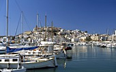 View of the boats, the port and old town Castle on the island of Ibiza