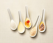Spoons with salt, oil, fruit, rice, tuna, Food, Nutrition