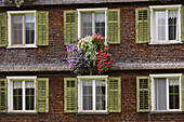 Wooden shingles, facade, window, flowers, Lech, Vorarlberg, Austria