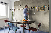 man in a modern prefab apartment in Berlin, Alexanderplatz, Berlin, Germany