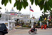 Presidential palace with monks, Vientiane, Laos, Asia