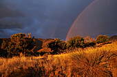 Rainbow and thunderstorm near Granada, near Monachil at the foothills of the Sierra Nevada, Andalusia, Spain