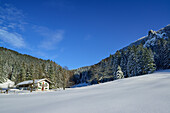 Alpine cottage in winter landscape, Hochries, Samerberg, Chiemgau range, Chiemgau, Upper Bavaria, Bavaria, Germany