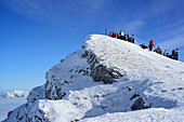 Group of persons at summit of Sonntagshorn, Sonntagshorn, Chiemgau range, Salzburg, Austria