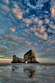 Archway Islands at sunrise, Wharariki Beach near Collingwood, Golden Bay, New Zealand