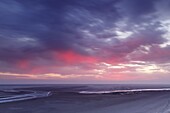 Sunrise over beach, Ameland, North Sea, Netherlands