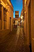 Cobblestone lane in the evening, Calle San Pedro, in the white town of Arcos de la Frontera, Cadiz province, Andalusia, Spain, Europe