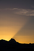 The last rays of the setting sun behind the Lauteraarhorn, Bernese Alps, canton of Bern, Switzerland
