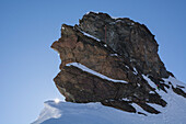 Alpinists abseiling from the summit of the western Breithornzwilling, Breithorn Massif, Valais Alps, canton of Valais and region of Aosta Valley, national border of Switzerland and Italy