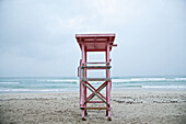 Colourful high seat on a beach by the sea, Mallorca, Spain