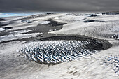 Aerial view of ice patterns and vrevasses at glaciated crater of volcano Katla, ice desert of glacier Myrdalsjokull, Highlands, South Iceland, Iceland, Europe