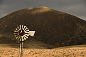 Windmill in front of a volcanoe, La Caldera de Gairía, Tiscamanita, Fuerteventura, Canary Islands, Spain