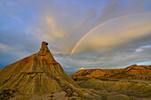 rainbow over Castil de Tierra, El Castildetierra, Bardenas Reales, semi-desert natural region (badlands), UNESCO biosphere reserve, Bardena Blanca, White Bardena, Navarra, Spain