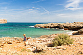 Tourist on the beach at S'Algar, Mediterranean Sea, Portocolom, Majorca, Balearic Islands, Spain, Europe