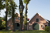 Red brick farmhouse between Elte and Hoerstel , Muensterland , North Rhine-Westphalia , Germany , Europe
