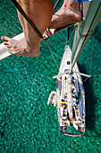 view from the masthead of an anchoring sailing yacht in a lonely bay on a greek island, Aegean, Cyclades, Greece