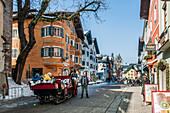 Shopping street in the old town Vorderstadt in Kitzbuehel, Tyrol, Austria, Europe