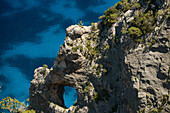 Rock arch on the mountainous coast above the sea, Golfo di Orosei, Selvaggio Blu, Sardinia, Italy, Europe