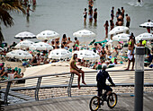 People sunbathing at Gordon beach, Tel Aviv, Israel