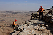 Climbing at the crater of Ramon near Mizpe Ramon, Desert of Negev, South-Israel, Israel
