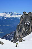 Woman back-country skiing descending Scharnitzsattel, Scharnitzsattel, Lechtal Alps, Tyrol, Austria