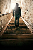 Mari man standing on staircase, Nizhniy Tagil, Sverdlovsk region, Russia