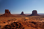 Butte rock formations in desert landscape, Monument Valley Tribal Park, Utah, United States, C1