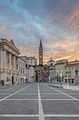 Clock tower, buildings and town square at sunrise, Piran, Coastal-Karst, Slovenia, Piran, Coastal-Karst, Slovenia