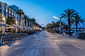 Promenade, buildings and city sidewalk at dusk, Split, Split, Croatia, Split, Split, Croatia