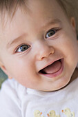Close up of smiling mixed race baby, C1