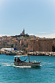 France, South Eastern France, Marseilles, small fishing boat getting out of the old harbour