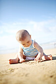 A 7 month baby boy on the beach