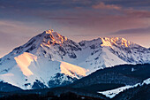 France, Midi Pyrenees, Hautes Pyrenees, Sunset on the Pic du Midi de Bigorre seen from the foothills near Lourdes