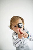 Portrait of boy wearing pirate costume