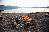 Bonfire on rocky beach