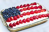 American Flag Cake Decorated with Blueberries and Strawberries