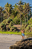 Couple on the beach in Bali. Indonesia