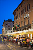 Outdoor restaurants on Corso Vannucci at dusk, Perugia, Umbria, Italy, Europe