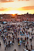 View over people in the Place Djemaa el Fna at sunset, Marrakech, Morocco, North Africa, Africa