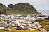 Overlooking the town of Heimaey from recent lava flow on Heimaey Island, Iceland, Polar Regions